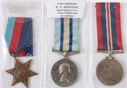 An ERII Royal Observers Corp LSGC medal named Chief observer O H Robertson:,