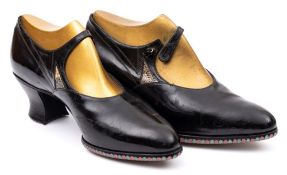 A pair of vintage lady's black leather and snakeskin dancing shoes:,