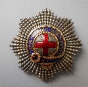 A Coldstream Guards enamelled sweetheart brooch: 43mm wide.