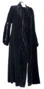 An early 20th Century black velvet evening dress by Marshall & Snellgrove:,