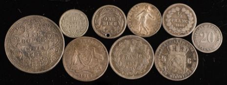 Nine silver foreign coins:.