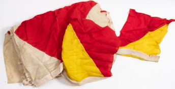 A group of fourteen signal flags for the letter 'F': and two smaller for 'O',