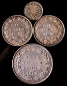 An 1813 three shilling bank token and two one and sixpence bank tokens 1812 and 1815.