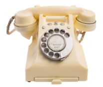 A 20th century 300 series ivory bakelite model PL57/2A telephone:.