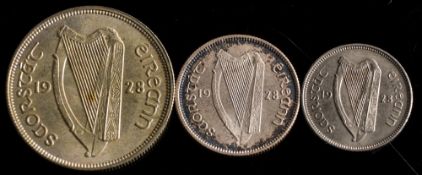 An Irish 1928 halfcrown, shilling and sixpence, (higher grade).