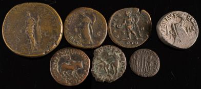 A group of seven various Roman coins:.