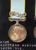 A Crimea medal: awarded to Pte. Pattison Horton, Grenadier Guards, with Sebastapol clasp.