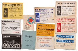 A group of club membership cards:,