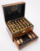 A Victorian walnut domestic medicine box by 'J M Rendall MPS Wholesale And Retail Homeopathic