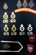Grenadier Guards: a collection of tunic shoulder titles, badges, epaulettes etc.