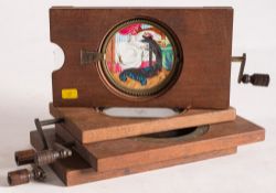 Four hand painted rack and pinion magic lantern slides:, comprising a windmill by Newton & Co,