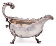 A George II silver sauce boat, all marks worm, London,