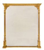 A 19th Century carved giltwood overmantel mirror: with a leaf decorated cornice of recessed broken