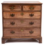An early 19th Century mahogany chest of drawers of small size: comprising two short over three long