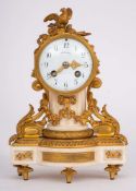 A French marble and ormolu mantel clock: the eight-day duration movement striking the hours and