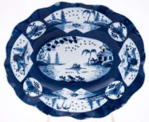 A Bow powder blue ground shaped oval dish and a similar hors d'oeuvres dish: both painted with