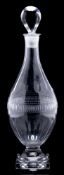 A Georgian glass decanter and stopper: of Indian Club shape with slice cut decoration and on square