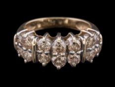 A diamond mounted two-row half-hoop ring: with round brilliant-cut diamonds estimated to weigh a