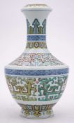 A Chinese doucai vase: of archaic form with waisted slender neck,