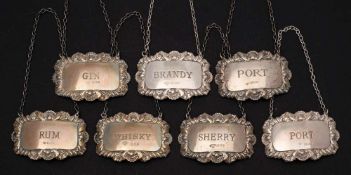Seven Elizabeth II silver decanter and spirit labels, maker A Chick & Sons Ltd, London,