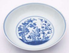 A Chinese blue and white 'Three Friends of Winter' saucer dish: the interior painted with a