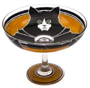 A Continental Art Deco period glass comport: the exterior boldly decorated with three black cats