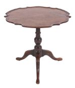 A mahogany pie crust tea table in the Georgian taste:,