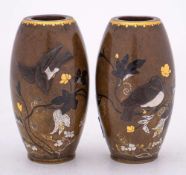 A pair of Japanese inlaid bronze vases: of ovoid form,