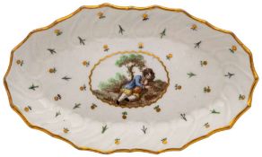 A Caughley spoon tray with painting attributed to Fidelle Duvivier: of spirally fluted oval form,