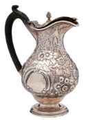 A George III Irish silver hot water jug, maker CV below a fleur-de-lys, Dublin,