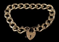 A gold curb-link bracelet: with attached 9ct gold heart-shaped padlock clasp,