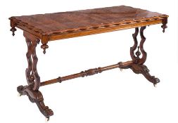 A Victorian rosewood centre or library table:,