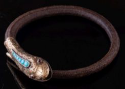 A mid 19th Century gold and turquoise mounted snake head hair bangle: with cabochon-set eyes,