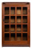An oak Arts and Crafts bookcase by Gustav Stickley:,