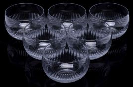 A set of six 19th century cut glass finger bowls: each with fluted band to the lower body, 13cm.