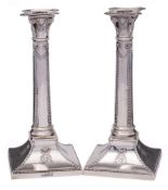 A pair of Victorian silver candlesticks, maker Thomas Bradbury & Sons,