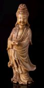 A Chinese carved soapstone figure of Guanyin and a soapstone brush washer: Guanyin wearing flowing