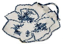 A First Period Worcester blue and white leaf dish: in the form of overlapping vine leaves with twig