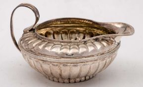 A George III silver cream jug, maker TH possibly Thomas Hobbs, London,