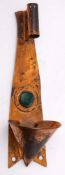 An Arts & Crafts period copper wall light: the shaped and tapering backplate with coned chimney,