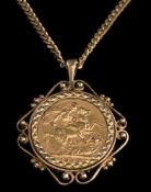A sovereign dated 1906 mounted as a pendant: within a 9ct gold frame and on a 9ct gold curb-link