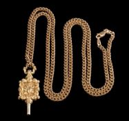 A 9ct gold curb-link chain with attached watch key of foliate design:,
