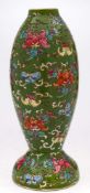 A Chinese famille rose vase and a Chinese green ground lamp base: the first painted with two