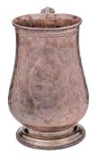 A Victorian Exeter silver tankard, maker Josiah Williams & Co, Exeter, 1870: inscribed,