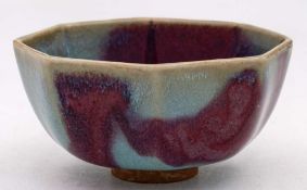 A Chinese porcelain bowl: of octagonal form decorated with Jun glazes, 8cm.