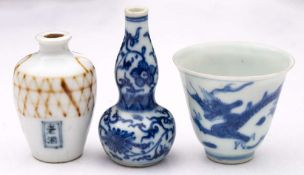 A Chinese 'Hatcher Cargo' blue and white 'Dragon' wine cup,