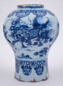 A large Dutch blue and white delft jar: of octagonal baluster form,