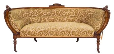 A Victorian carved walnut settee:,