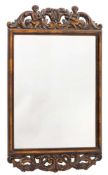 A carved walnut rectangular mirror in the William and Mary taste:,