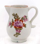 A Lowestoft sparrow beak cream jug: painted in 'Tulip Painter' style with a floral spray and